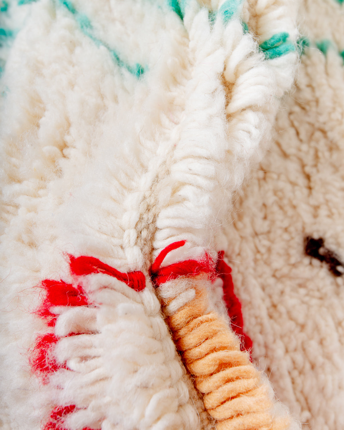 Modern, designer, handcrafted Berber rug from Morocco. Beniourain carpet with beautiful colours and patterns and fluffy wool texture.